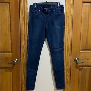 Jennifer Lopez jeans with black and silver side